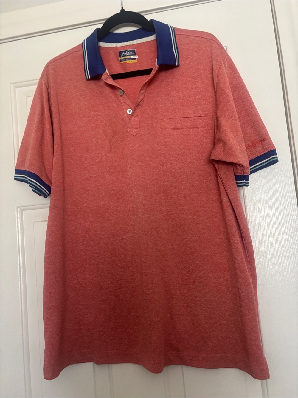 Jack Nicklaus Men's Coral Heather Polo with Navy Trim Collar & Sleeves
